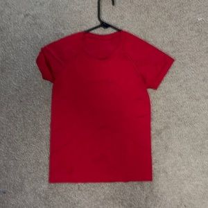 Never worn. Dark red. Never worn. Race length lulu shirt.